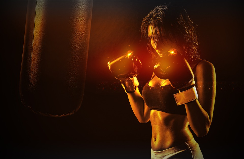 An atheletic girl in the boxing sport