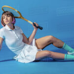 A sensual semi nude girl showing atheletic punches